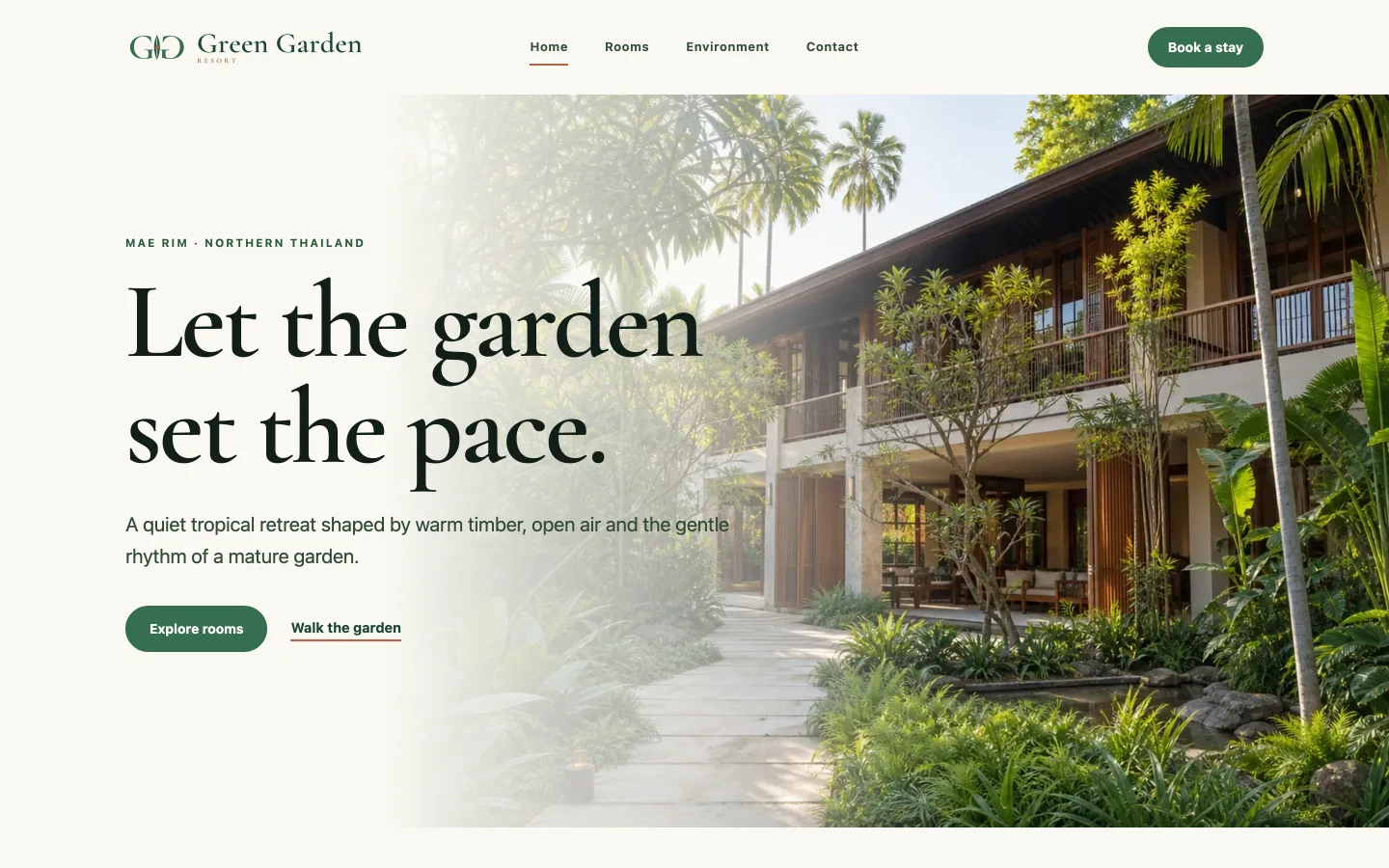 Green Garden Resort demo site — a garden resort homepage with room types and grounds photography